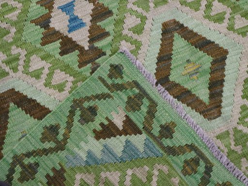 Surface texture of New Modern Design rug with natural Wool and intricate pattern