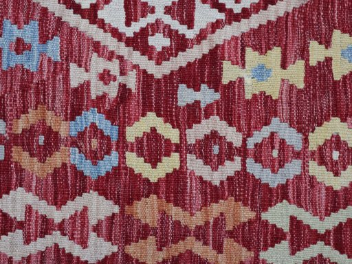 Backside of handmade New Modern Design rug showing knot structure and weave density