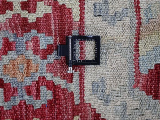 Corner detail of New Modern Design rug showing border pattern and Wool pile