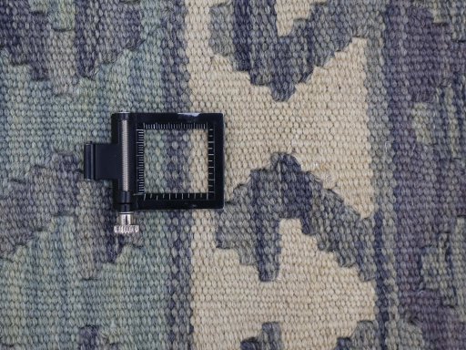Corner detail of New Modern Design rug showing border pattern and Wool pile
