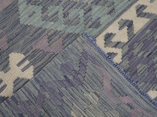 Surface texture of New Modern Design rug with natural Wool and intricate pattern