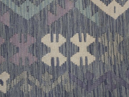 Backside of handmade New Modern Design rug showing knot structure and weave density