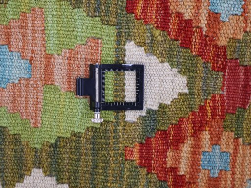 Corner detail of New Modern Design rug showing border pattern and Wool pile