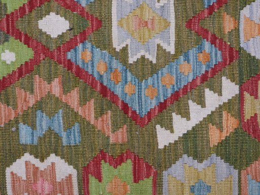 Backside of handmade New Modern Design rug showing knot structure and weave density