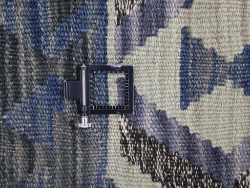 Corner detail of New Modern Design rug showing border pattern and Wool pile