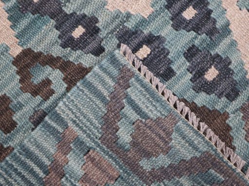 Surface texture of New Modern Design rug with natural Wool and intricate pattern