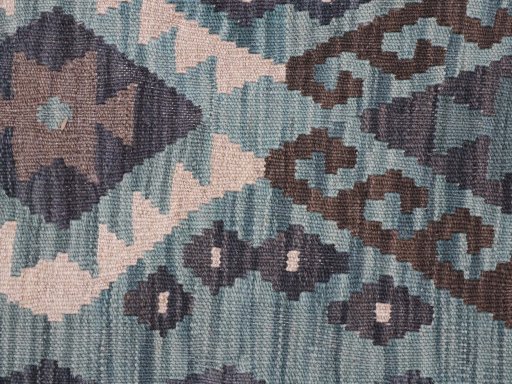 Backside of handmade New Modern Design rug showing knot structure and weave density