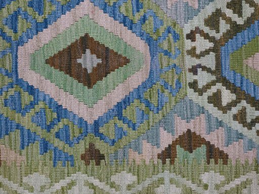 Backside of handmade New Modern Design rug showing knot structure and weave density