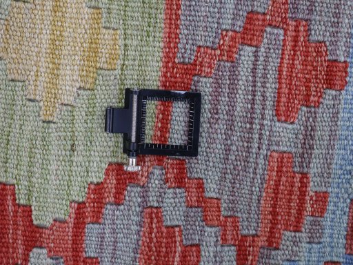 Corner detail of New Modern Design rug showing border pattern and Wool pile
