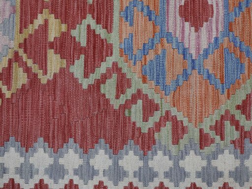 Backside of handmade New Modern Design rug showing knot structure and weave density