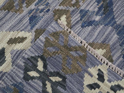 Surface texture of New Modern Design rug with natural Wool and intricate pattern