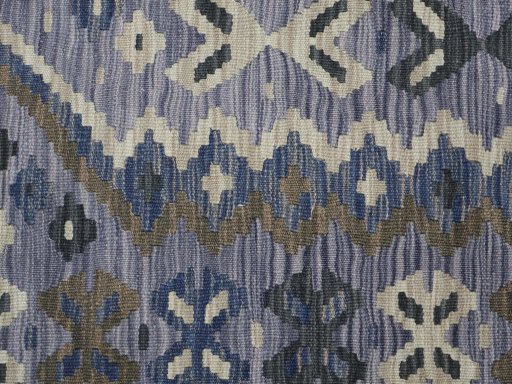 Backside of handmade New Modern Design rug showing knot structure and weave density