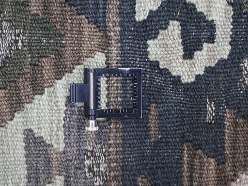 Corner detail of New Modern Design rug showing border pattern and Wool pile
