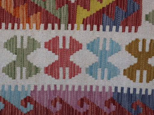 Backside of handmade New Modern Design rug showing knot structure and weave density