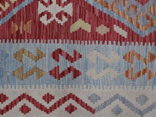 Backside of handmade New Modern Design rug showing knot structure and weave density