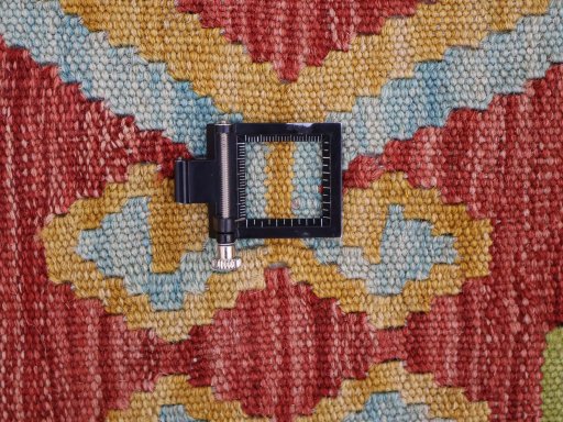 Corner detail of New Modern Design rug showing border pattern and Wool pile