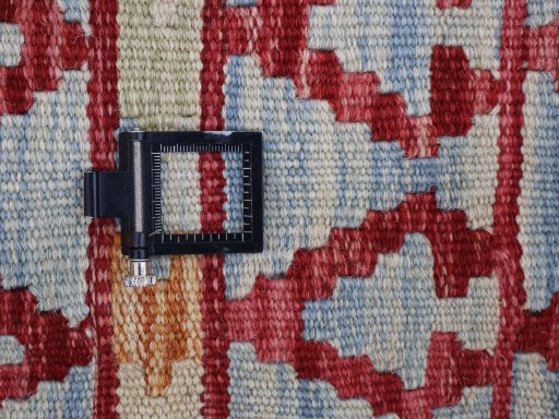 Corner detail of New Modern Design rug showing border pattern and Wool pile