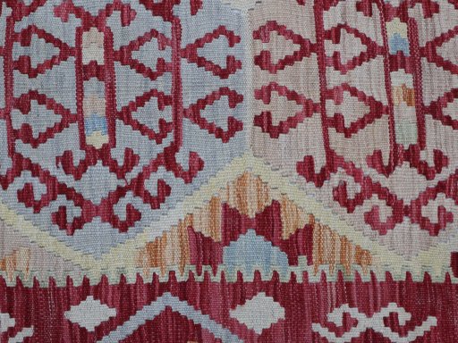 Backside of handmade New Modern Design rug showing knot structure and weave density