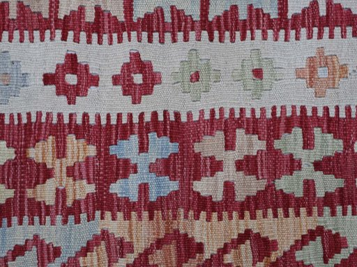 Backside of handmade New Modern Design rug showing knot structure and weave density