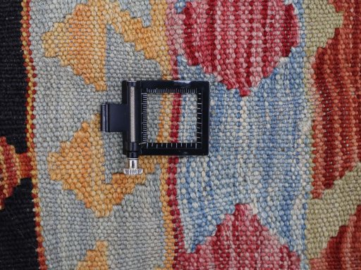 Corner detail of New Modern Design rug showing border pattern and Wool pile