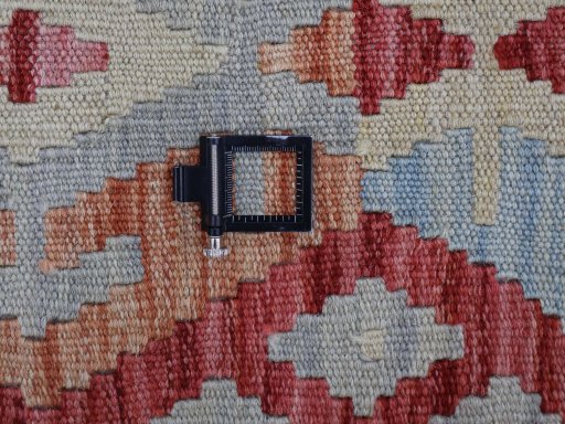 Corner detail of New Modern Design rug showing border pattern and Wool pile