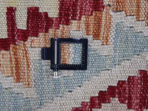 Corner detail of New Modern Design rug showing border pattern and Wool pile