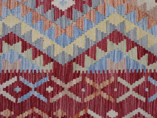 Backside of handmade New Modern Design rug showing knot structure and weave density