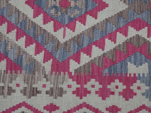 Backside of handmade New Modern Design rug showing knot structure and weave density