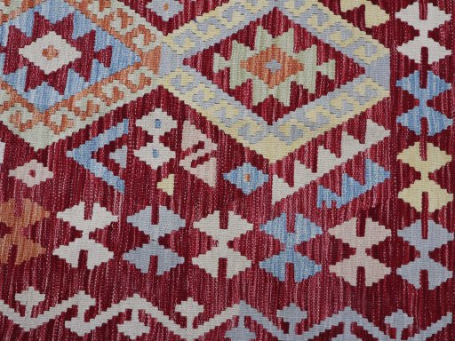 Backside of handmade New Modern Design rug showing knot structure and weave density