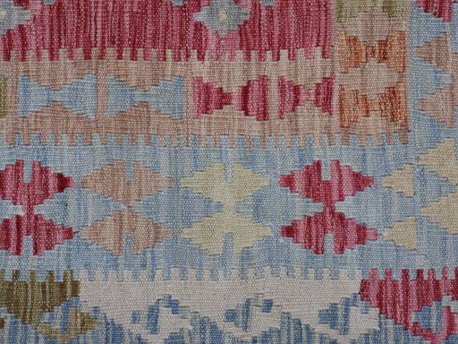 Backside of handmade New Modern Design rug showing knot structure and weave density