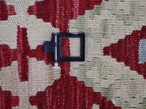 Corner detail of New Modern Design rug showing border pattern and Wool pile