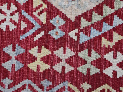 Backside of handmade New Modern Design rug showing knot structure and weave density