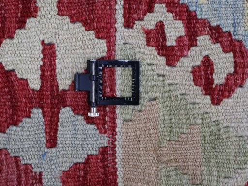 Corner detail of New Modern Design rug showing border pattern and Wool pile