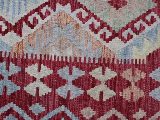 Backside of handmade New Modern Design rug showing knot structure and weave density
