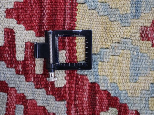 Corner detail of New Modern Design rug showing border pattern and Wool pile
