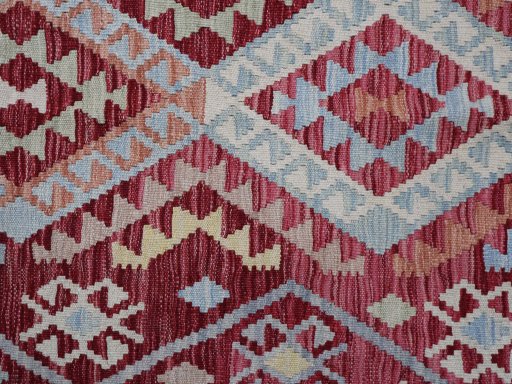 Backside of handmade New Modern Design rug showing knot structure and weave density