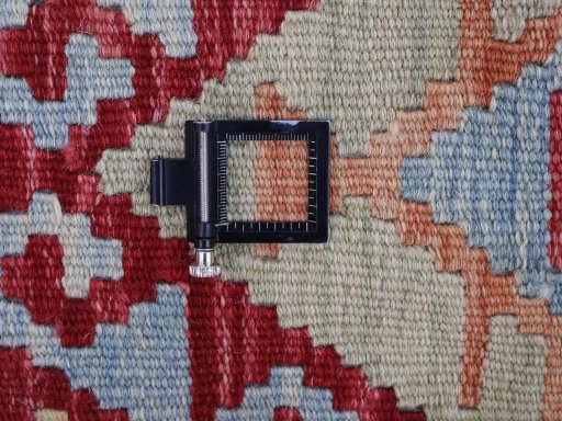 Corner detail of New Modern Design rug showing border pattern and Wool pile