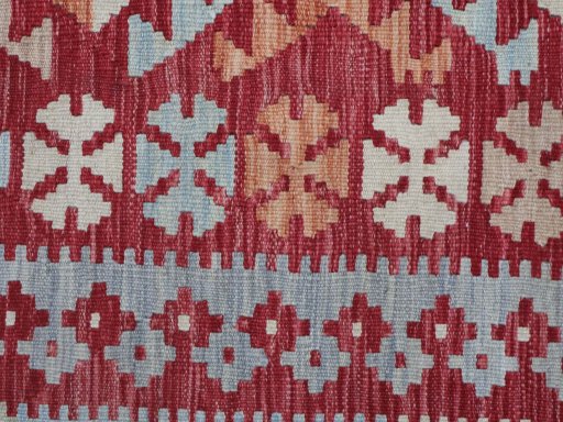 Backside of handmade New Modern Design rug showing knot structure and weave density