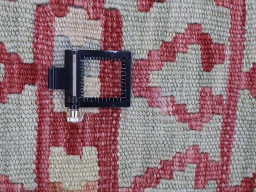 Corner detail of New Modern Design rug showing border pattern and Wool pile