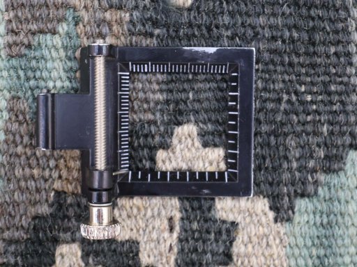 Corner detail of New Modern Design rug showing border pattern and Wool pile