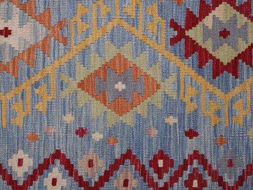 Backside of handmade New Modern Design rug showing knot structure and weave density