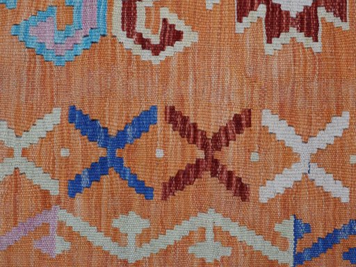Backside of handmade New Modern Design rug showing knot structure and weave density