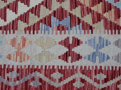 Backside of handmade New Modern Design rug showing knot structure and weave density