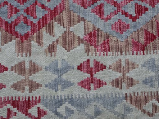 Backside of handmade New Modern Design rug showing knot structure and weave density