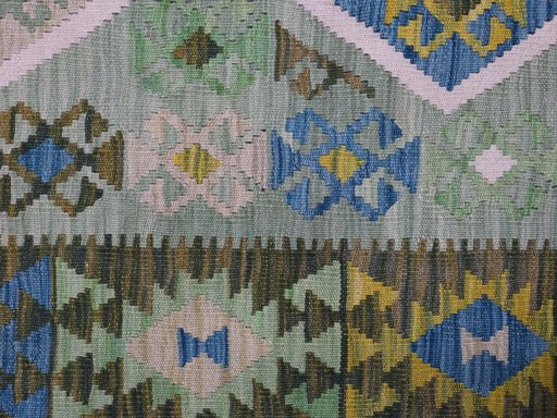 Backside of handmade New Modern Design rug showing knot structure and weave density