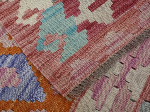 Backside of handmade New Modern Design rug showing knot structure and weave density