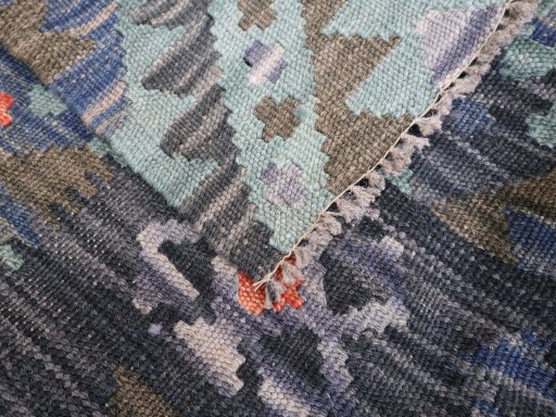 Surface texture of New Modern Design rug with natural Wool and intricate pattern