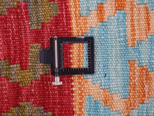 Corner detail of New Modern Design rug showing border pattern and Wool pile
