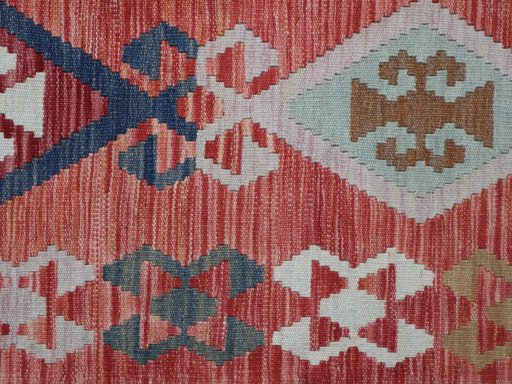 Backside of handmade New Modern Design rug showing knot structure and weave density
