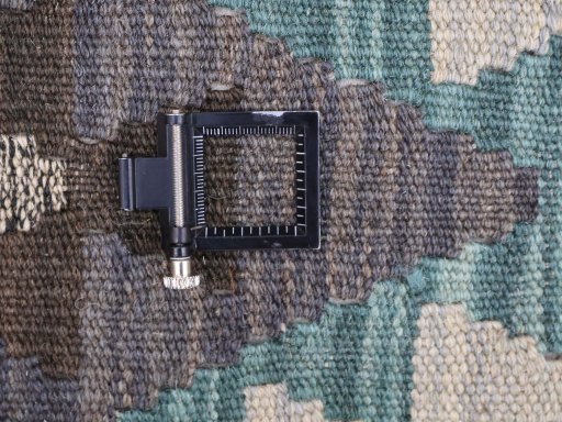 Corner detail of New Modern Design rug showing border pattern and Wool pile